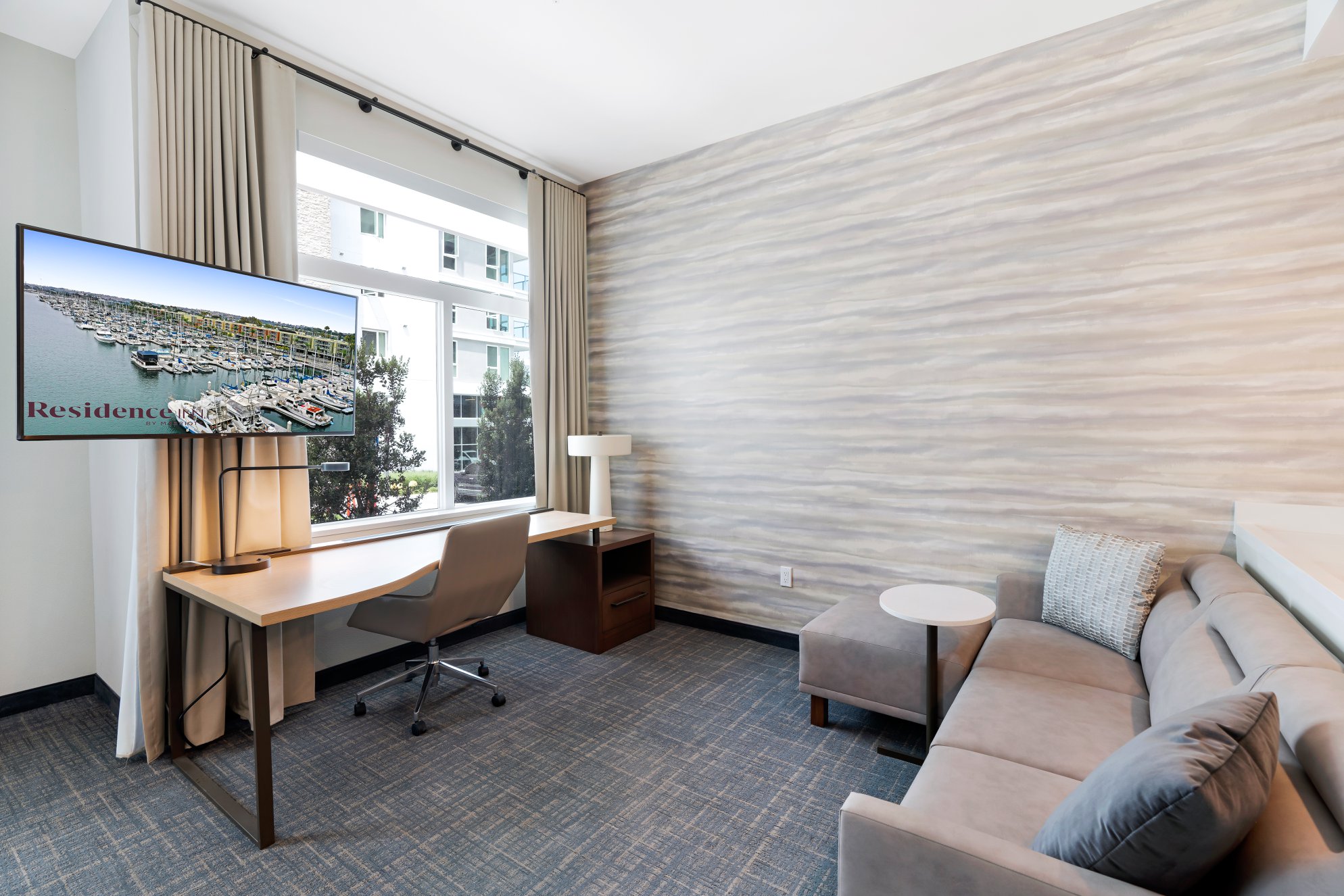 Living room with couch and tv in Residence Inn Marina del Rey