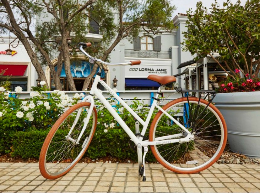 bike parked in front of waterside marina shopping retail center