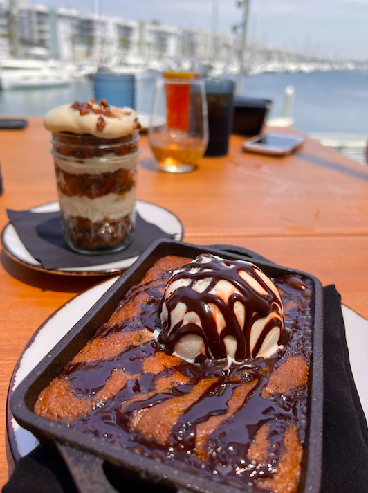 chocolate chip cookie with ice cream and chocolate syrup